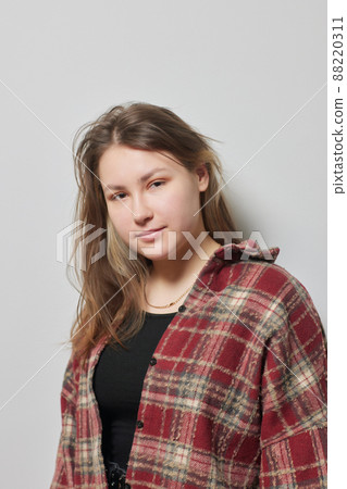 piercings on an ear. Conch and helix piercings close up. 88220311