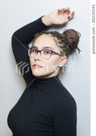 piercings on an ear. Conch and helix piercings close up. 88220343