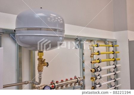 Plumbing service. copper pipeline of a heating system in boiler room. 88221194