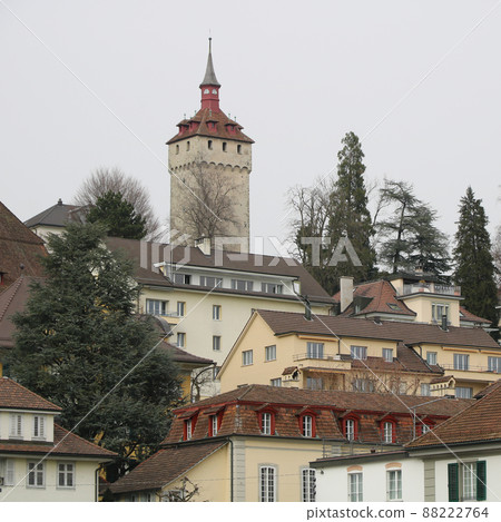 Roofs of houses in Lucerne and Wachtturm, historic tower. Roofs of houses in Lucerne and Wachtturm, historic tower. 88222764