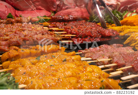 Showcase with a variety of raw meat Dishes. Showcase with a variety of raw meat Dishes. 88223192