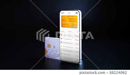 Online banking. Mobile phone with internet online bank app. Credit card on black background. Save money business wallet. Online banking. Mobile phone with internet online bank app. Credit card on black background. Save money business wallet. 88224062