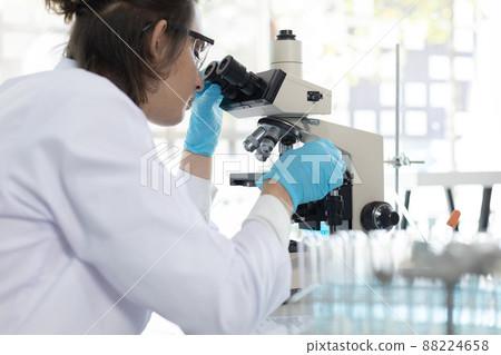 Scientists or researchers perform microscopic endoscopy to examine changes in the chemical reactions and degradation of cells, Lab experiments, Researchers scientist working analysis with test tube. Scientists or researchers perform microscopic endoscopy to examine changes in the chemical reactions and degradation of cells, Lab experiments, Researchers scientist working analysis with test tube. 88224658