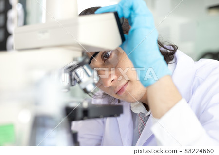 Scientists or researchers perform microscopic endoscopy to examine changes in the chemical reactions and degradation of cells, Lab experiments, Researchers scientist working analysis with test tube. Scientists or researchers perform microscopic endoscopy to examine changes in the chemical reactions and degradation of cells, Lab experiments, Researchers scientist working analysis with test tube. 88224660
