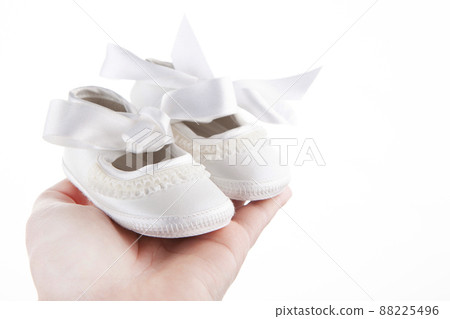 image of shoes hand white background 88225496