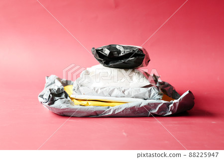 stack of delivery package red background  stack of delivery package red background  88225947