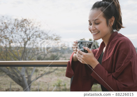 Series photo of young woman hand holding ceramic mug, positive emotion, chill and joyful Series photo of young woman hand holding ceramic mug, positive emotion, chill and joyful 88226015
