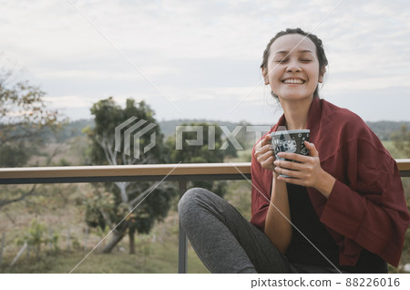 Series photo of young woman hand holding ceramic mug, positive emotion, chill and joyful Series photo of young woman hand holding ceramic mug, positive emotion, chill and joyful 88226016