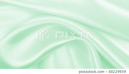 Smooth elegant green silk or satin luxury cloth texture as abstract background. Luxurious background design Smooth elegant green silk or satin luxury cloth texture as abstract background. Luxurious background design 88229939
