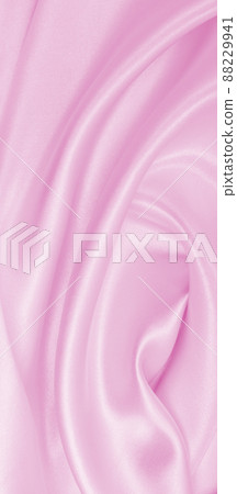 Smooth elegant pink silk or satin texture as wedding background. Luxurious background design Smooth elegant pink silk or satin texture as wedding background. Luxurious background design 88229941