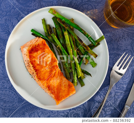 Fresh salmon steak with bunch of roasted asparagus Fresh salmon steak with bunch of roasted asparagus 88236392