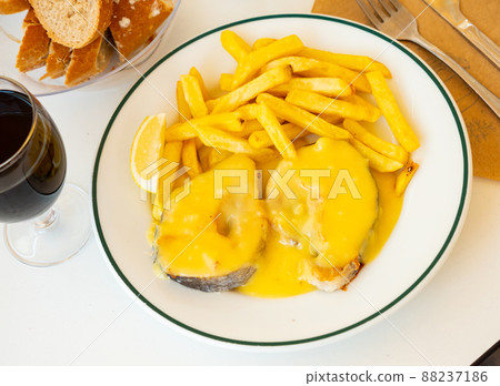 Stewed hake Merluza en salsa holandesa with potatoes Stewed hake Merluza en salsa holandesa with potatoes 88237186