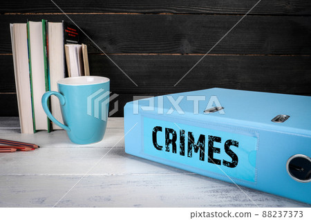 Crimes. Laws, regulations and policies concept. Document folder on office desk 88237373