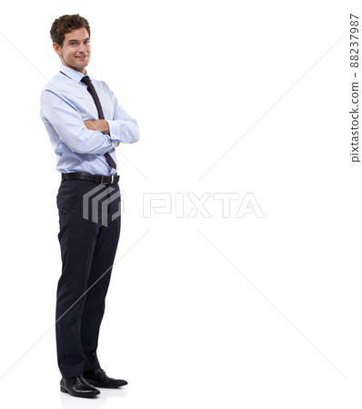 Confidently endorsing your copyspace. A handsome young businessman standing against a white background. 88237987