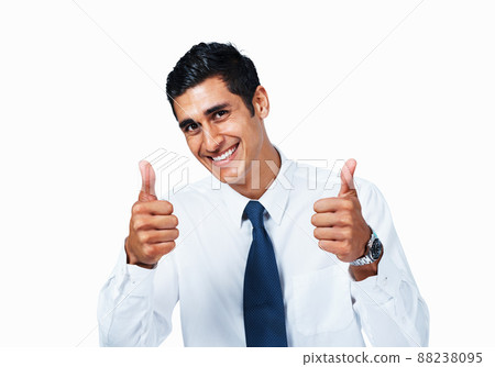 Business man giving okay gesture. Handsome young business man showing okay gesture on white background. 88238095