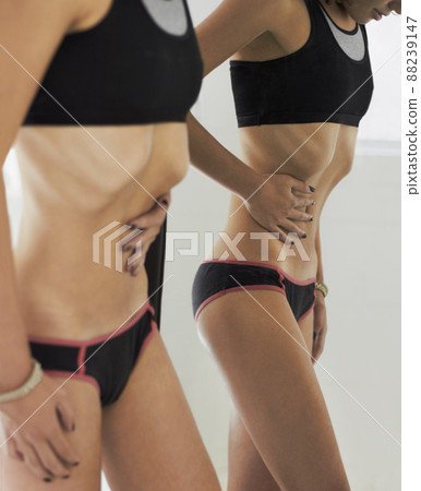 Shell never be skinny enough. A very skinny girl obsessing over her body. Shell never be skinny enough. A very skinny girl obsessing over her body. 88239147