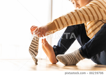 Boys wearing socks 88239786