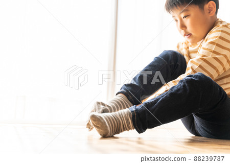 Boys wearing socks 88239787