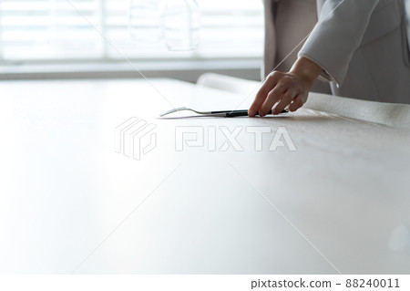 Woman working in restaurant Woman working in restaurant 88240011