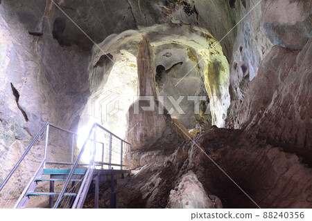 Urai Thong Cave is a cross limestone cave . There are three caves in the mountain, La-ngu district,Satun Province, Thailand Urai Thong Cave is a cross limestone cave . There are three caves in the mountain, La-ngu district,Satun Province, Thailand 88240356