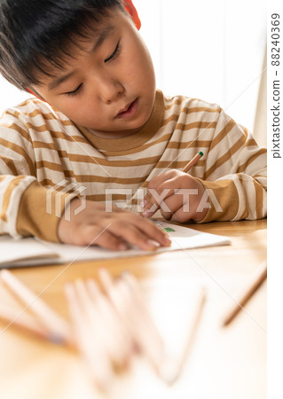 Coloring book colored pencil boy 88240369