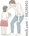 A girl giving a present to her father on Father's Day 88240401