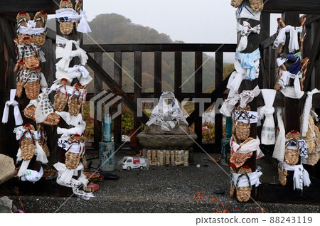 Sacred place Osorezan Jikaku Daishido offering and straw Sacred place Osorezan Jikaku Daishido offering and straw 88243119