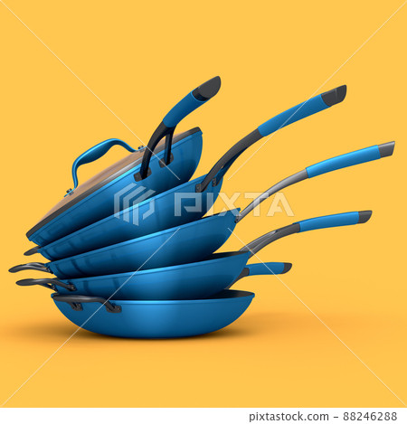 Stack of frying pan with glass lid on yellow, non-stick kitchen utensils Stack of frying pan with glass lid on yellow, non-stick kitchen utensils 88246288