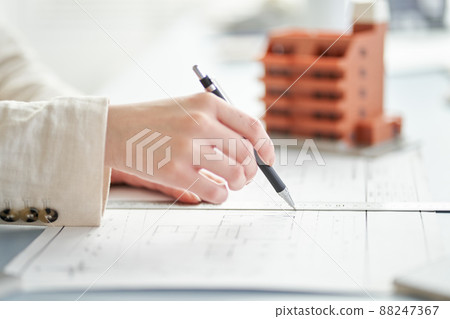 At the hands of a female architect who designs an apartment At the hands of a female architect who designs an apartment 88247367
