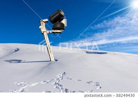 Snow Cannon or Snowmaking System on Winter Landscape with Powder Snow Snow Cannon or Snowmaking System on Winter Landscape with Powder Snow 88249430