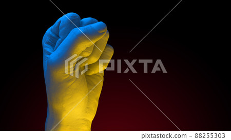 Fist in colors of Ukrainian Flag raised to fight and resist russian agression Fist in colors of Ukrainian Flag raised to fight and resist russian agression 88255303