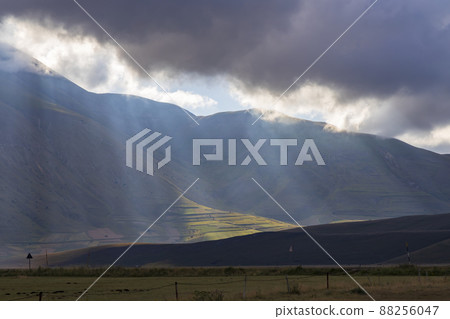 Dramatic mountain landscape near Castelluccio village in National Park Monte Sibillini, Umbria region, Italy Dramatic mountain landscape near Castelluccio village in National Park Monte Sibillini, Umbria region, Italy 88256047