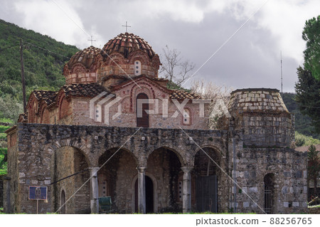 Greek Orthodox Holy Apostles Medieval Church exterior with cross above dome. Greek Orthodox Holy Apostles Medieval Church exterior with cross above dome. 88256765