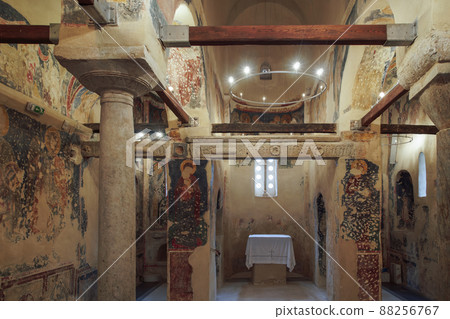 Greek Orthodox Medieval Church interior with Palaeologan Byzantine art frescoes. 88256767