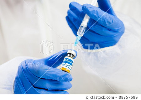 Coronavirus COVID-19 vaccine development concept 88257689