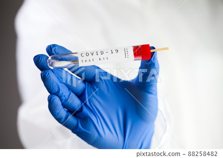 Doctor holding PCR COVID-19 test Doctor holding PCR COVID-19 test 88258482