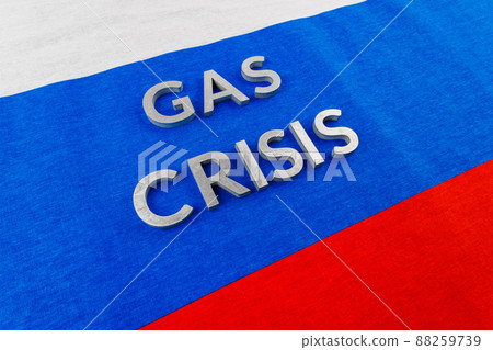 the words gas crisis laid with silver letters over flat russian flag surface 88259739