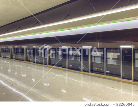 Platform sliding doors are a system used at subway stations that isolates passengers from railway tracks for the safety of passengers. The doors open after the train arrives at the station Platform sliding doors are a system used at subway stations that isolates passengers from railway tracks for the safety of passengers. The doors open after the train arrives at the station 88260043