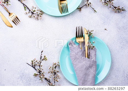 Spring table setting with blooming branch Spring table setting with blooming branch 88263297