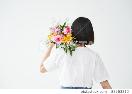 woman holding a bouquet woman holding a bouquet 88263813