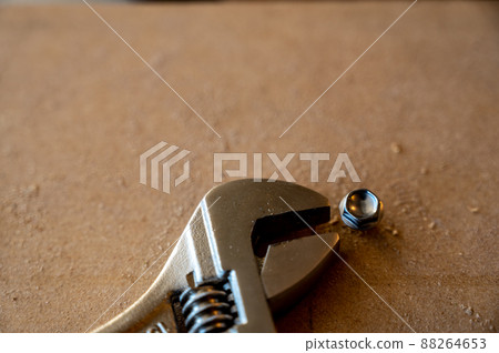 rounded stuck bolt head next to a crescent wrench rounded stuck bolt head next to a crescent wrench 88264653