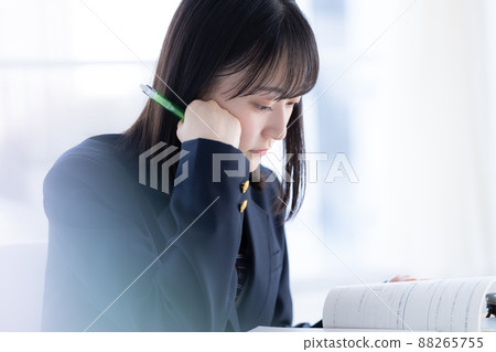 Portrait of a high school girl studying 88265755
