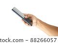 hand holding black smartphone isolated 88266057