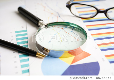 Magnifying glass on charts graphs paper. Financial development, Banking Account, Statistics, Investment Analytic research data economy. Magnifying glass on charts graphs paper. Financial development, Banking Account, Statistics, Investment Analytic research data economy. 88266437