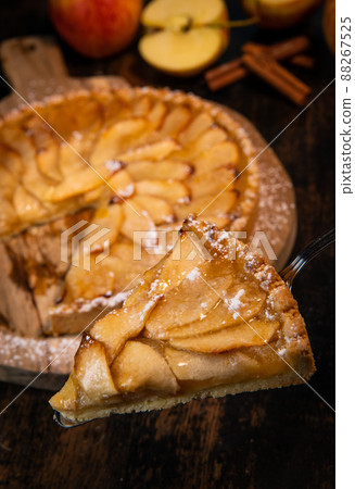 Delicious apple pie on a wooden table, from above 88267525