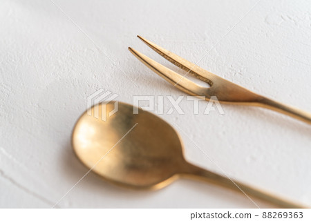Gold spoon and fork fashionable 88269363