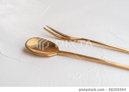 Gold spoon and fork fashionable 88269364