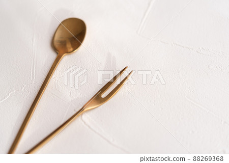 Gold spoon and fork fashionable Gold spoon and fork fashionable 88269368
