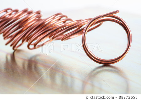 Copper wire on metallic surface 88272653