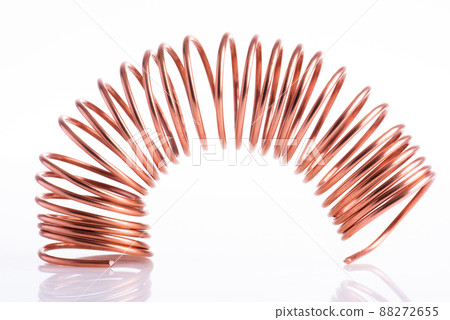 Spiral copper wire on white background Spiral copper wire on white background 88272655